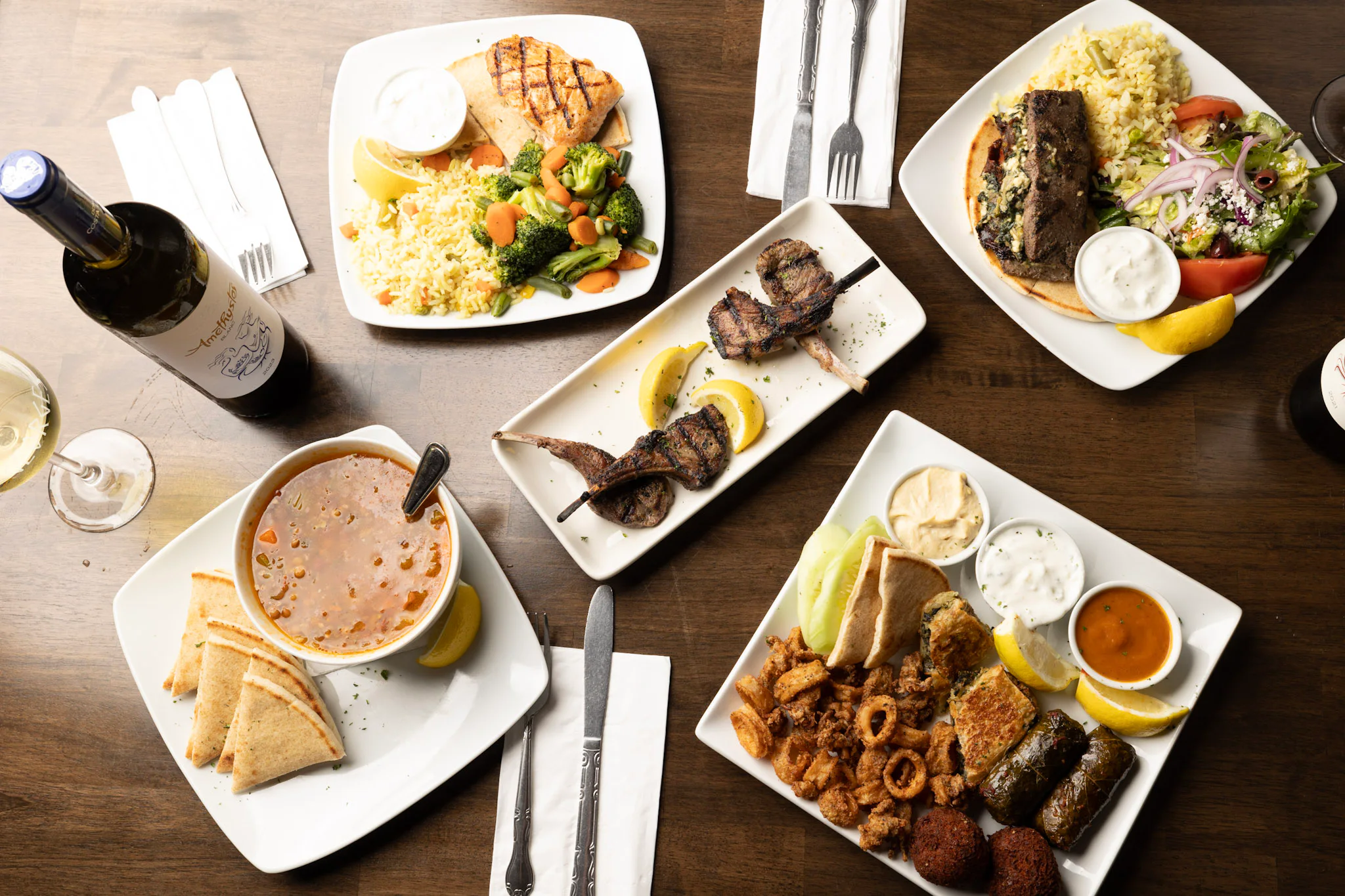 Greek dishes arranged across a table at George’s